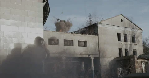 Explosion of an artillery shell from falling into an abandoned building  Stock Footage 153626217
