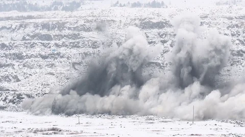 Explosion blast in open cast mining quarry mine Stock Footage 84568409