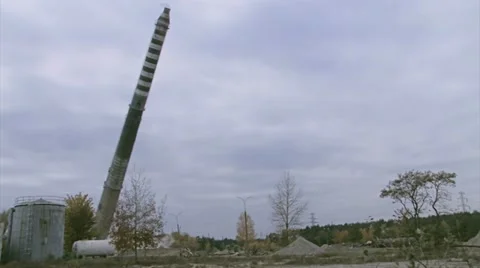 Explosion Collapse of factory chimney. Located in a post-industrial area. 動画素材 22048389