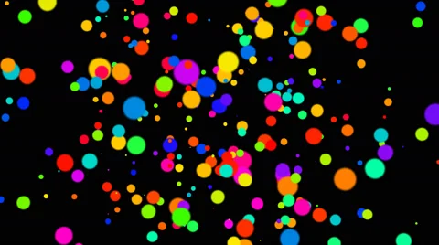 Explosion of colored dots on black background Stock Footage