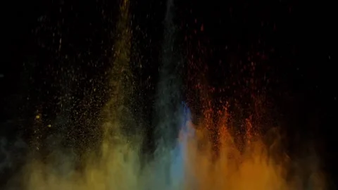 The explosion of colored dry ink on a black background Stock Footage 98092042