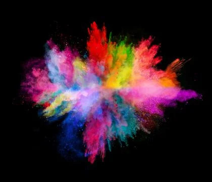 Explosion of colored powder on black background Stock Photos