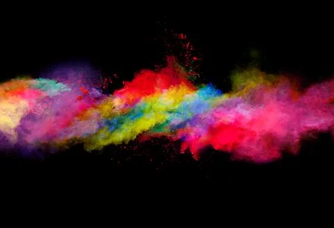 Explosion of colored powder on black background Stock Photos