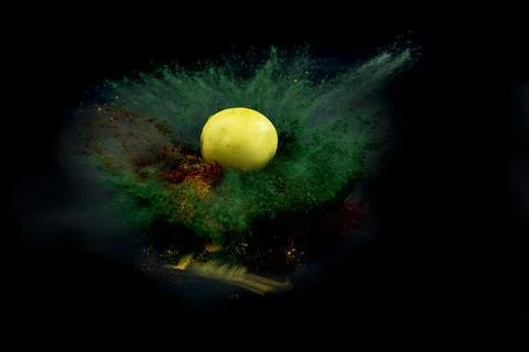 Explosion of colored powder with space for lime on abstract background Stock Photos