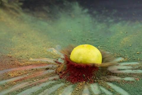 Explosion of colored powder with space for lime on abstract background Stock Photos