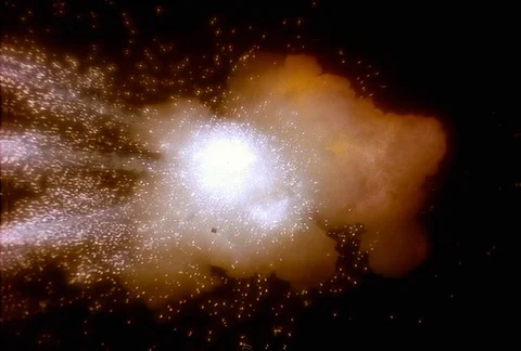 Explosion with comet approaching viewer and sparks filling frame Stock Footage 86914824
