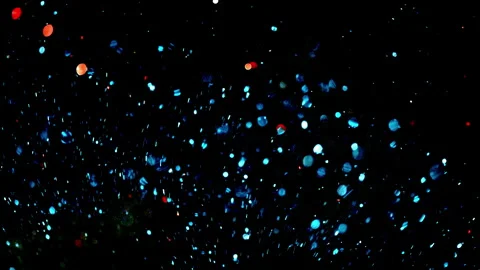 Explosion of dust particles and shiny bl... | Stock Video | Pond5