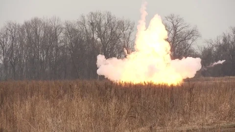 Explosion in field Video stock 76940162