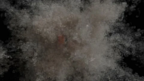 An explosion of fire culminates in a cloud of grey smoke in fine swirls against Stock Footage 239883917