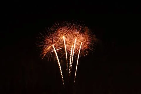 Explosion fire work isolated on a black background 库存照片