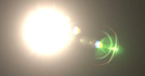 Explosion of the flash and strong light, optical lens with bokeh effect. Bright Stock Photos