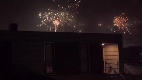 Explosion of Flash Behind Building At Night, Celebration and Fireworks in Stock Footage 263526724