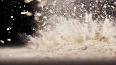 Explosion of flour and light captures dynamic motion Stock Photos