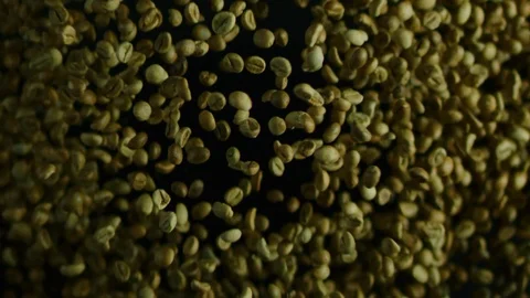 Explosion of green coffee beans, making espresso coffee in slow motion Video stock 118709439