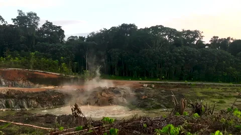 Explosion. Hard rock is broken up in a powerful explosion to build a dam. Stock Footage 245273529