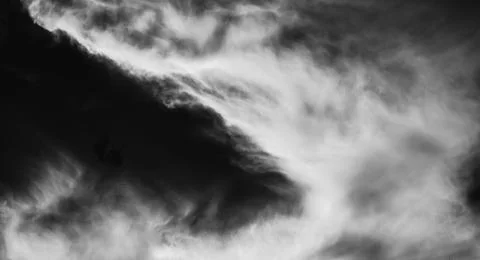 Explosion by an impact of a cloud of particles of powder of color white on a Stock Photos