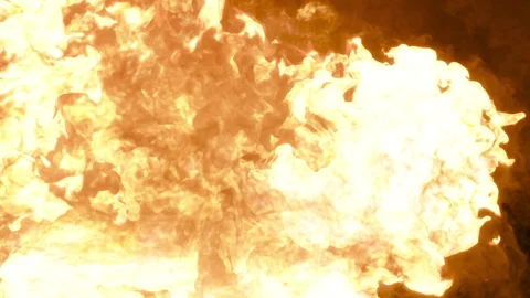 An explosion with a large release of heat, a fire on a black background Stock Footage 274259823