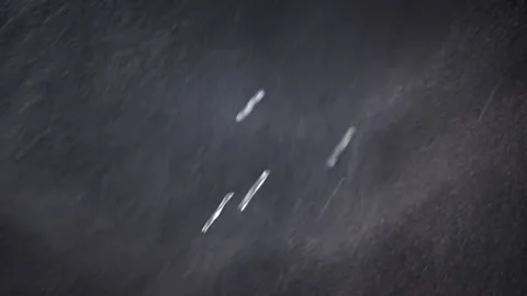 Explosion of Mixed Particles of Water, Dust on Black Background. Slow motion Stock Footage 237716935