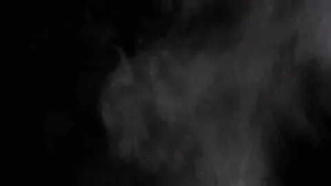 Explosion of Mixed Particles of Water Vapor Smoke Isolated on Black Background Stock Footage 236191078