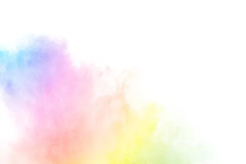 The explosion of multi colored powder. Beautiful rainbow color powder. Stock Photos