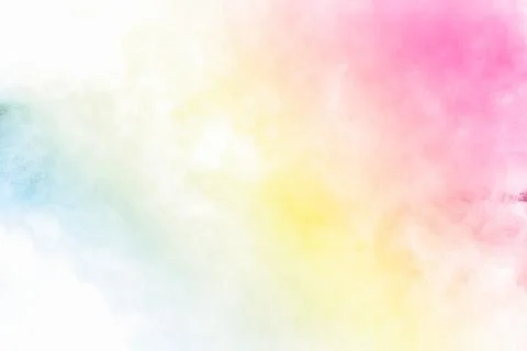The explosion of multi colored powder. Beautiful rainbow color powder. Stock Photos