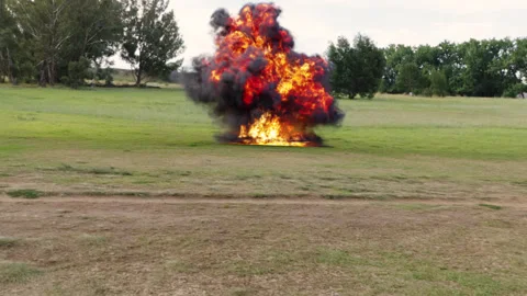 An explosion in the nature. film an explosion. camera shake Video stock 273692616