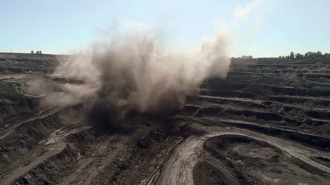 Explosion open mine. Detonation rocks in quarry Mining Aerial Powerful explosion Stock Footage 108415387