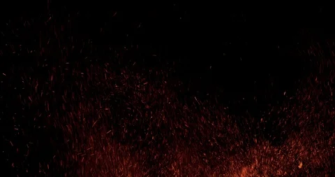 Explosion of particle sparks from a large fire floating in the air on black 스톡 동영상 122075919