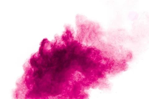 Explosion of pink colored powder isolated on white background.Pink dust splas Stock Photos