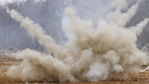 The explosion of a reconstruction combat charge at the site during the battle Stock Photos