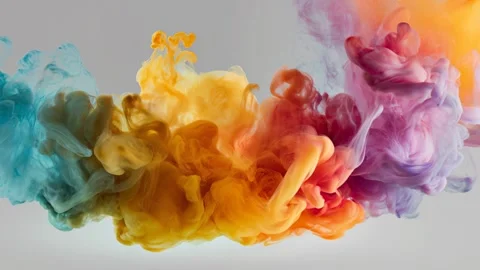 Explosion of smoke clouds with blue, orange and yellow tones Stock Footage 316822906