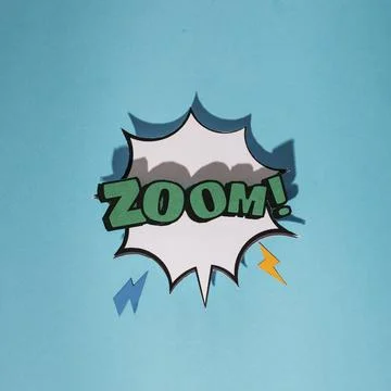 Explosion sound effect with zoom text speech bubble against blue background Stock Photos