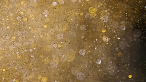 An explosion of sparkling dust. Splash of shiny silver and gold particles. 스톡 동영상 269708739