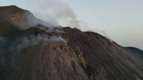Explosion on Stromboli volcano at sunset, Sicily - 4K 60 FPS Aerial drone Stock Footage 201882969