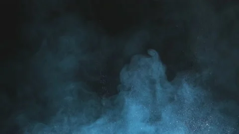 The explosion wave of blue shimmering particles. slow motion Video stock 153576645