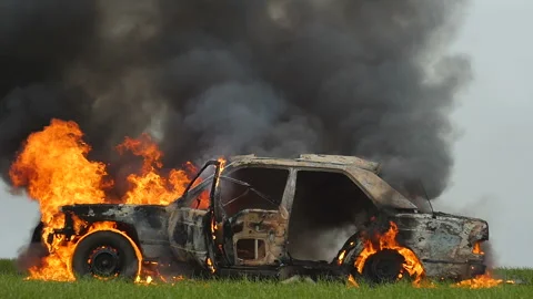 Explosion Wheel In Slow Motion, Wheel Explosion In Burning Car, Side View. Stock Footage 98650043