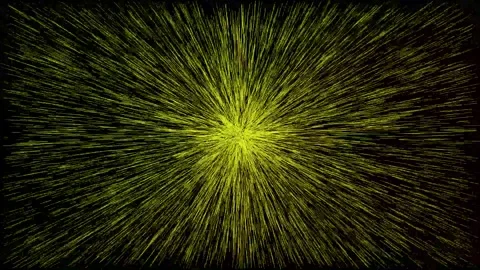 Explosion of yellow particles radiating from center on black background motio Video stock 337805297