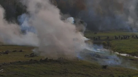 Explosions and gunfire, German vs Russian military forces in reenactment of WWII Video stock 101218054