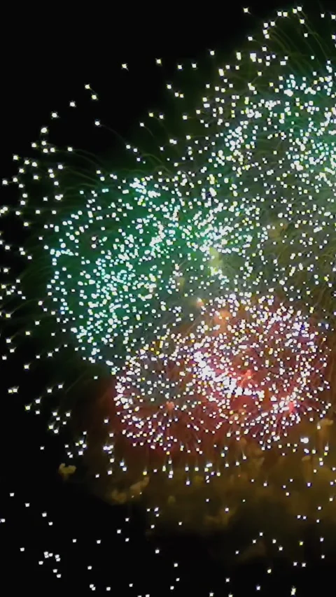 Explosions of Light Bright up the Night Sky During Independence Day Stock Footage 344464350