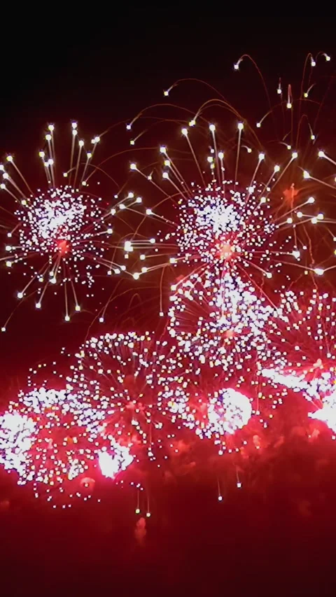 Explosive bursts of color in slow motion over a summer night sky Stock Footage 289391471