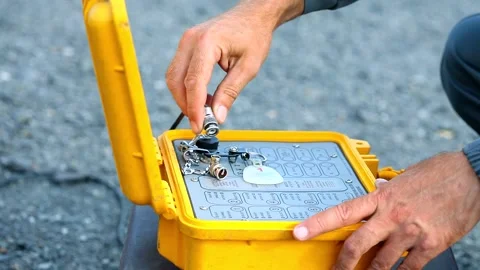 Explosive in a career. explosive work in a career. The blaster prepares for a Video stock 165900268