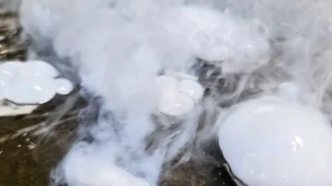 Explosive Fog: Up-Close with Dry Ice Bubbles in Slow Motion 動画素材 330991788