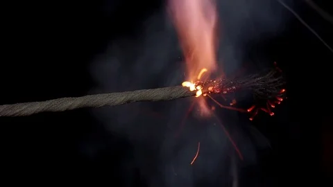 Explosive fuse ignited by a burning match Stock Footage 69901068