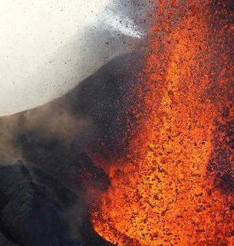 Explosive Lava Fountain Erupting from Active Volcanic Crater Stock Photos