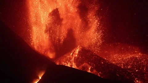 Explosive nocturnal volcanic eruption with lava Stock Footage 163454161