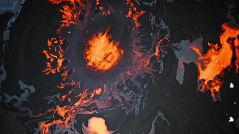 Explosive Orange Fire Effect in Liquid Macro Shot with Dynamic Motion Stock Footage 317539596
