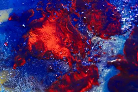 Explosive Red Energy Flow on Deep Blue Abstract Background Stock Photos