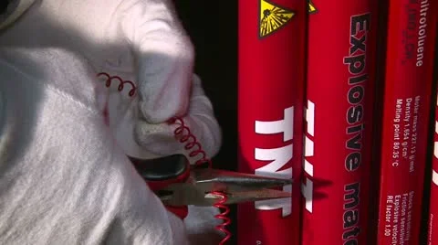 Explosive TNT, cutting red wire Stock Footage 21939456