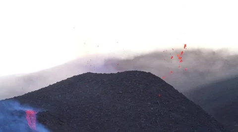Explosive volcanic eruption with lava flow Stock Footage 53303538