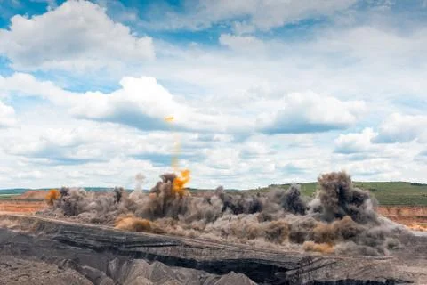Explosive works on open pit Stock Photos